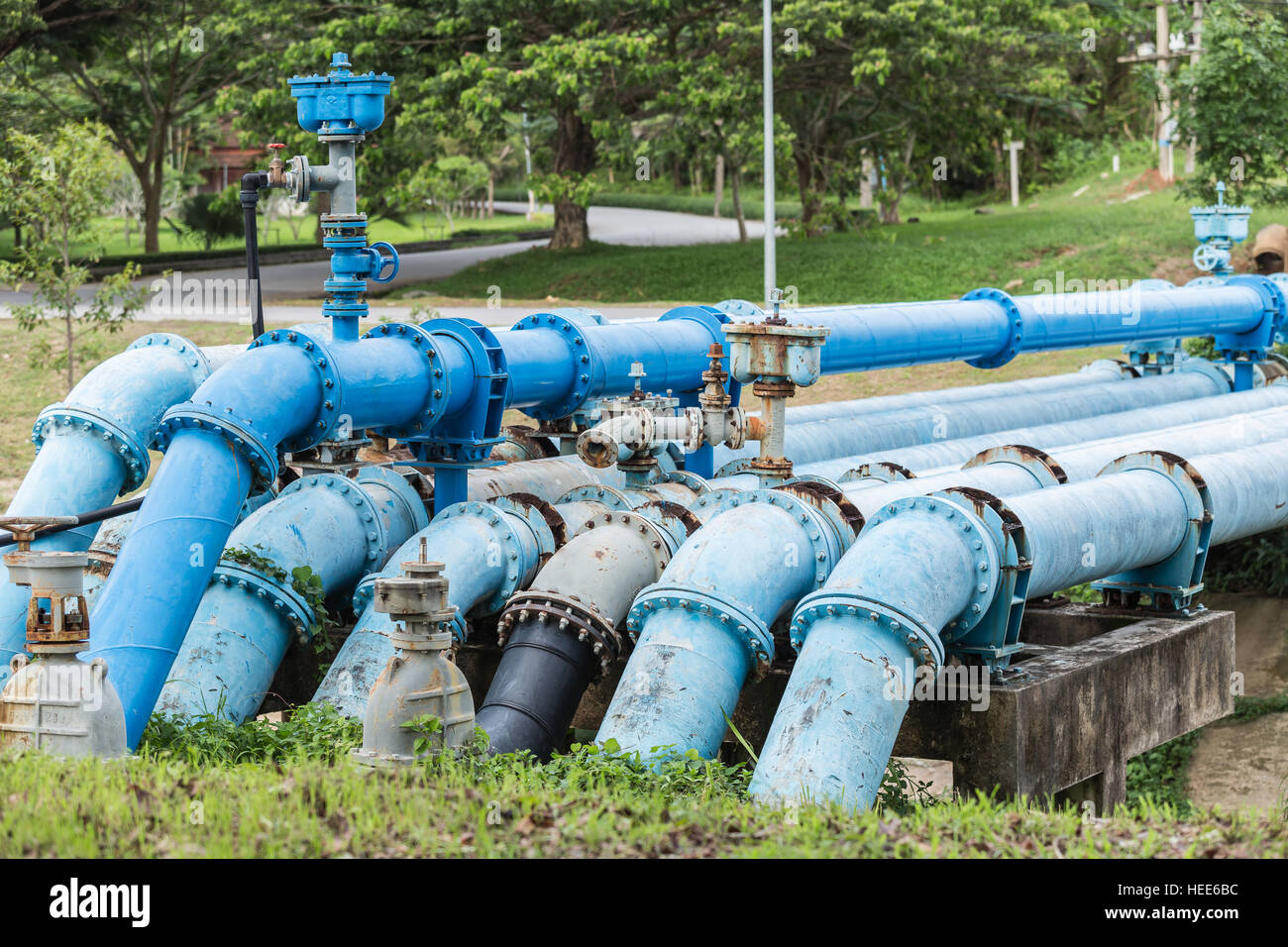 Old big blue color main pipe for water supply Stock Photo