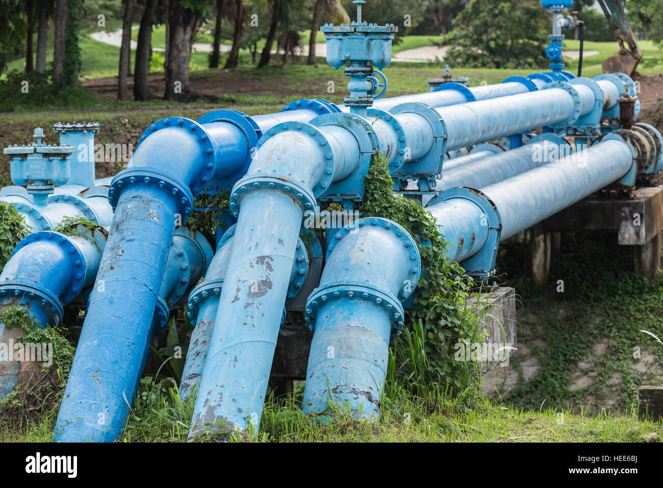Old big blue color main pipe for water supply Stock Photo