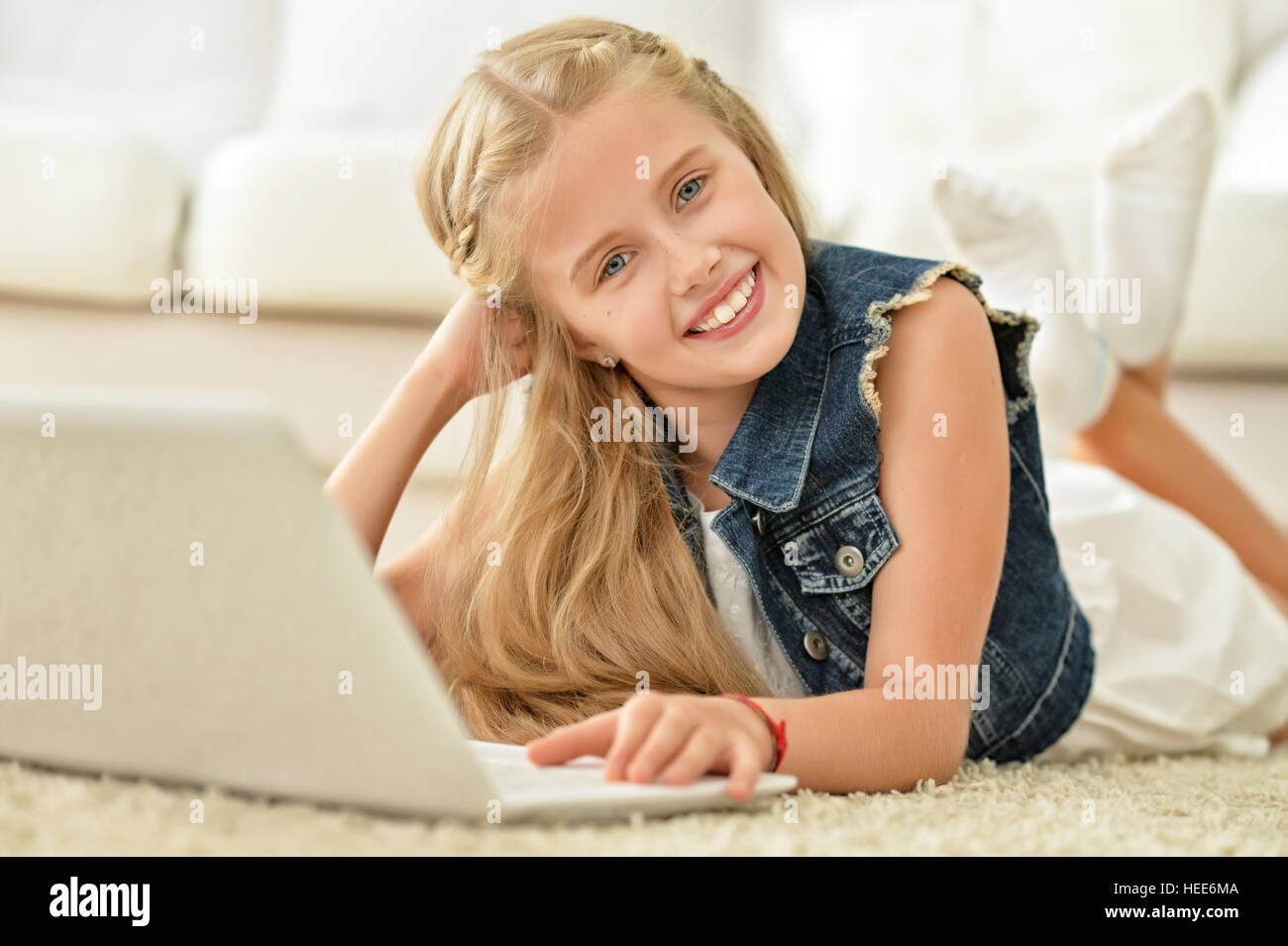 cute girl using computer Stock Photo - Alamy