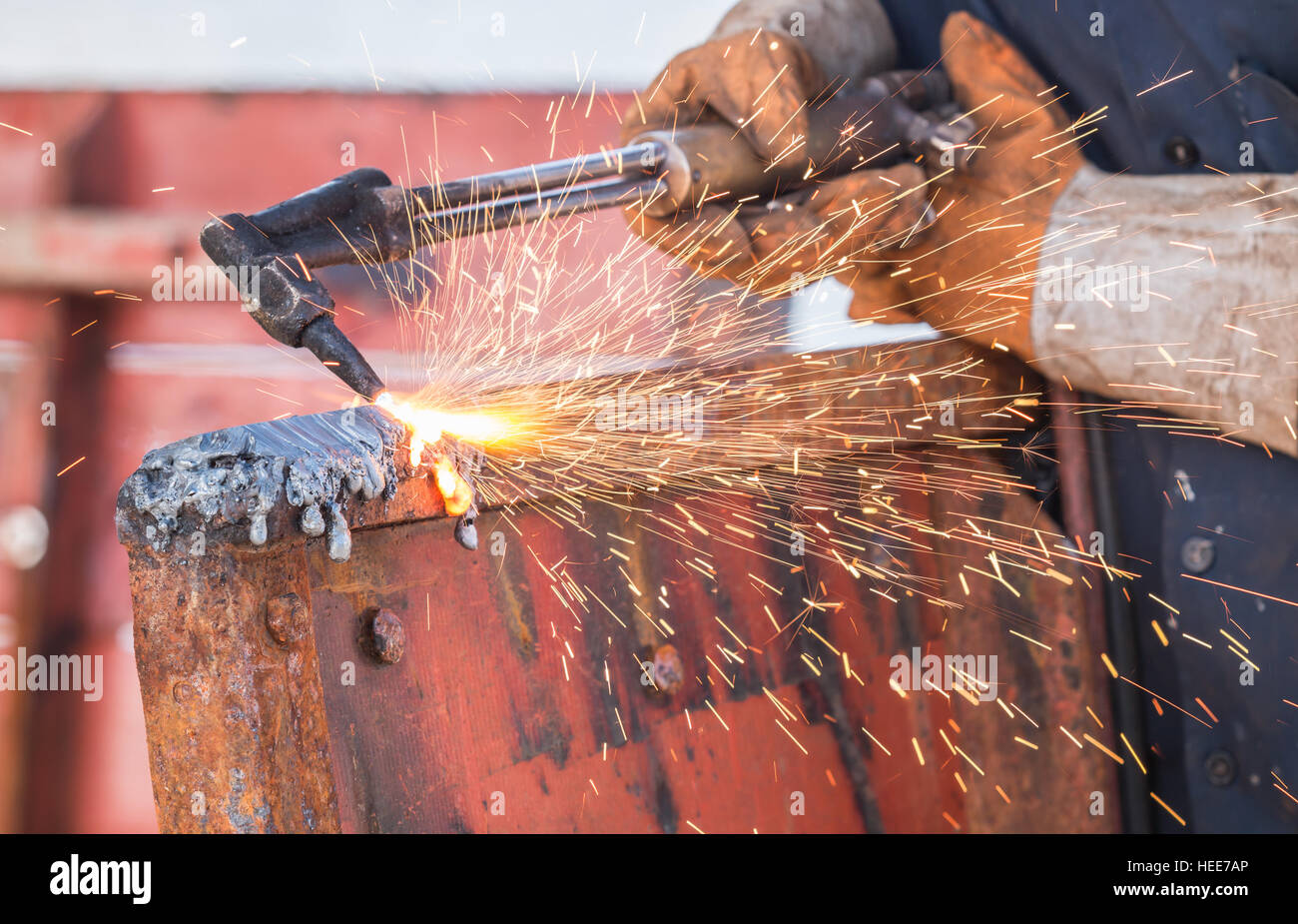 A worker cutting steel using metal torch Stock Photo - Alamy