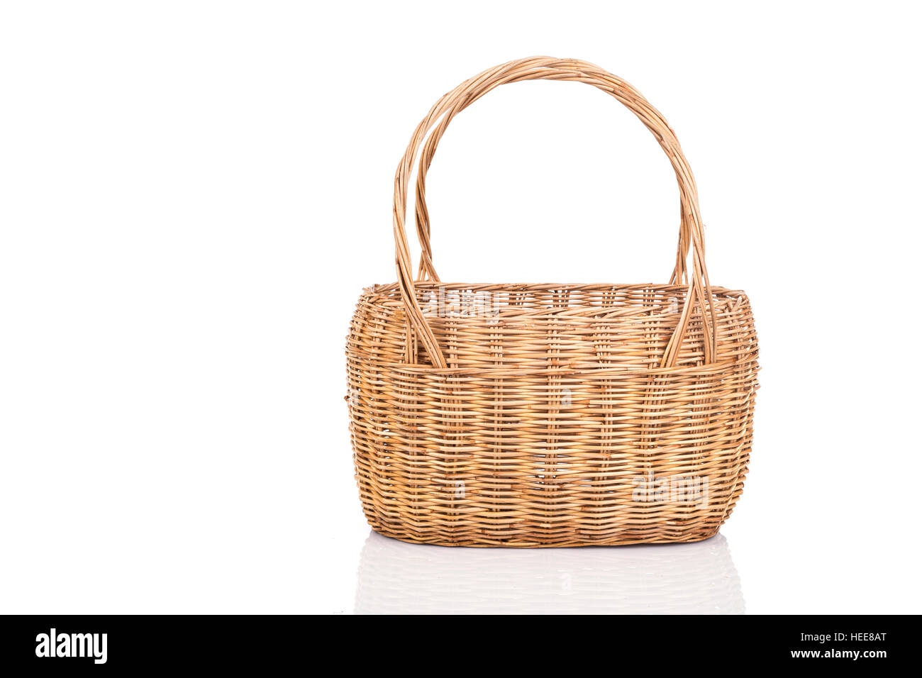 Close up handmade rattan basket isolated on white background Stock