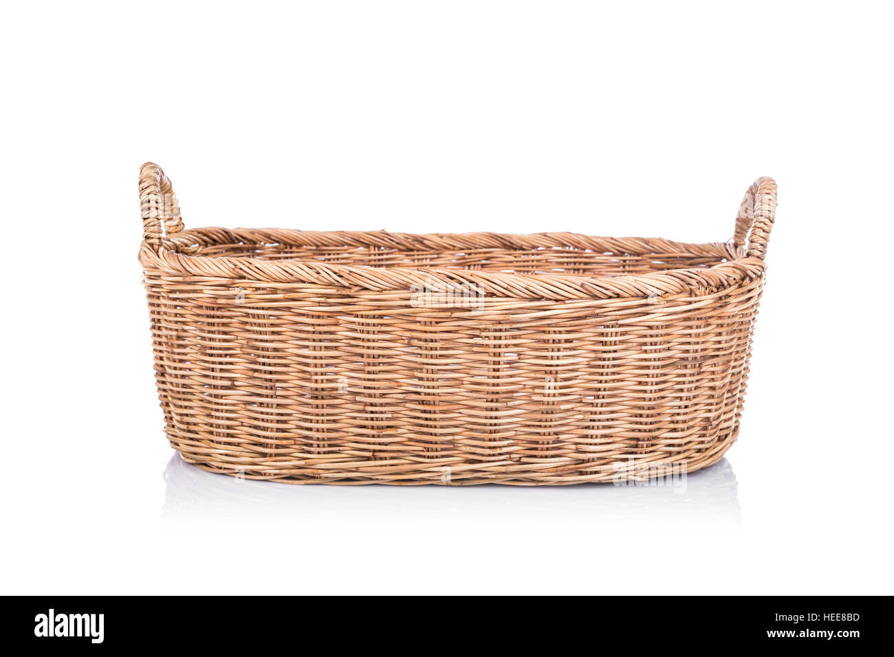 Close up handmade rattan basket isolated on white background Stock Photo
