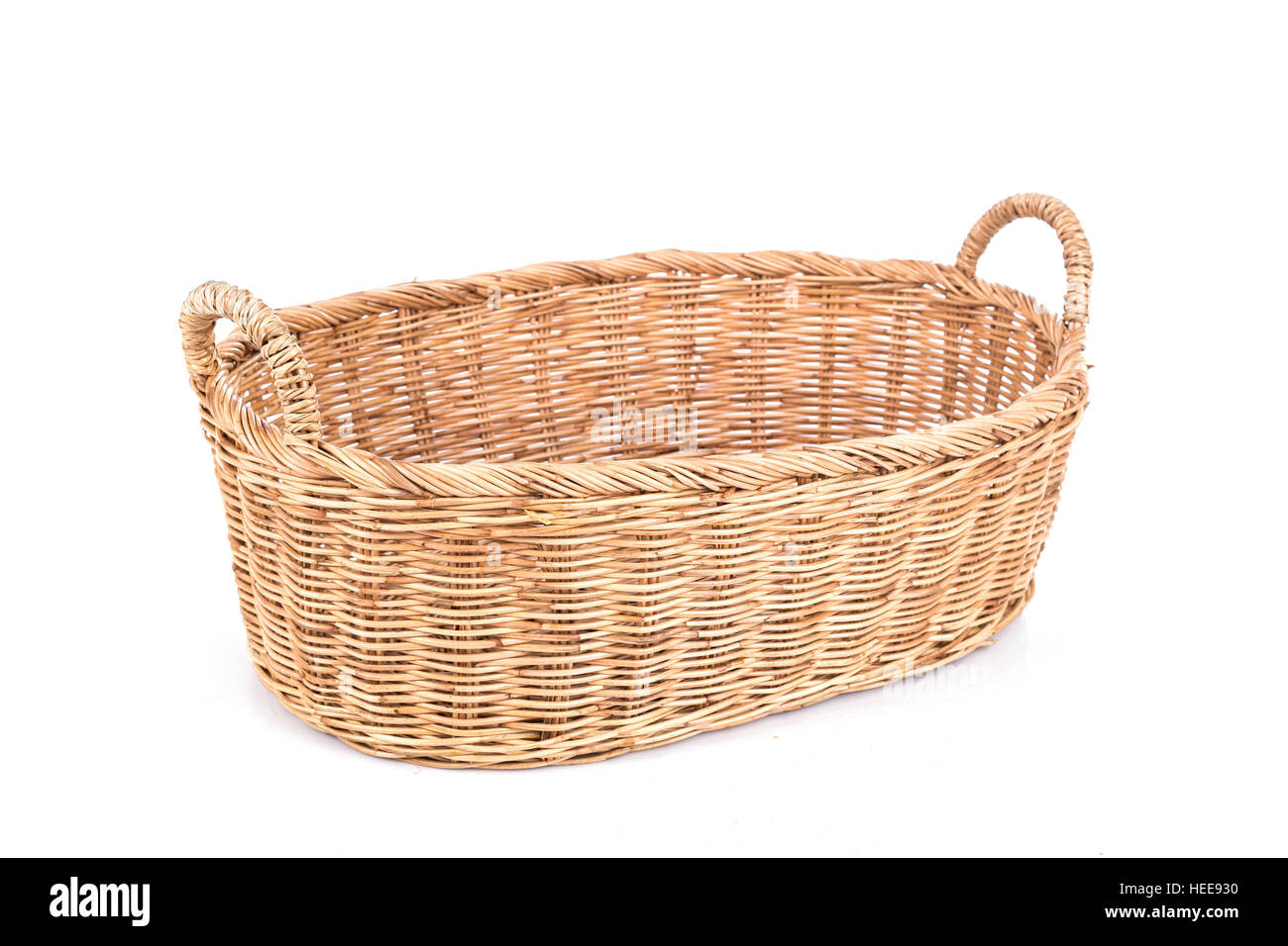 Close up handmade rattan basket isolated on white background Stock