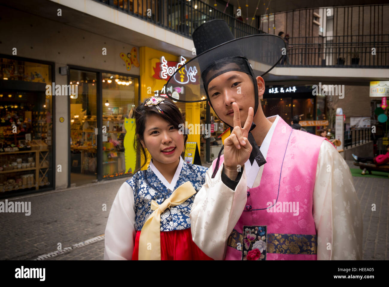 Young couple wearing Korean traditional costume (Hanbok), Insa-dong, Jongno-gu, Seoul, Korea Stock Photo