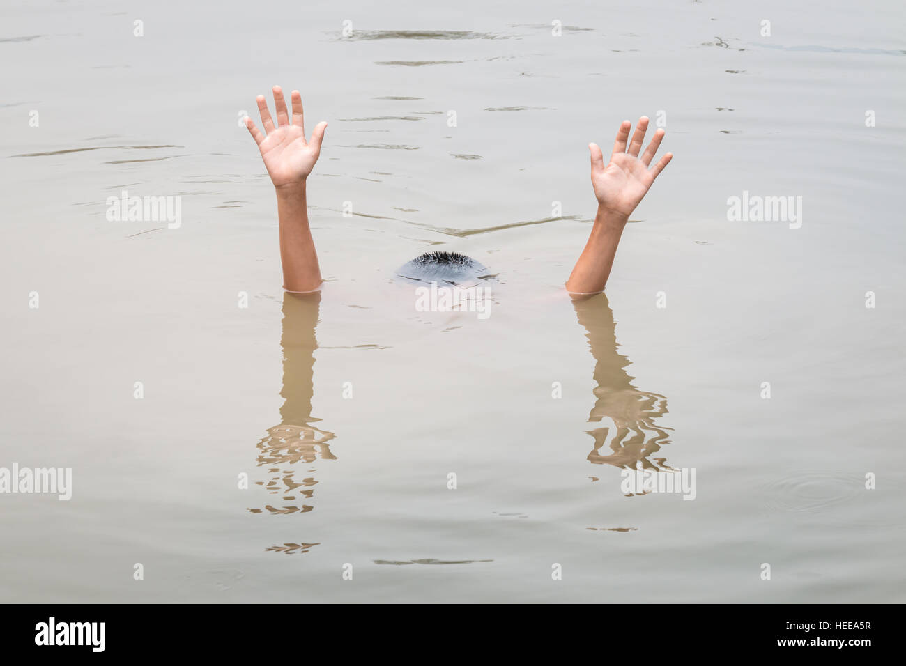 Thai children in big water pond : Concept drowning Stock Photo