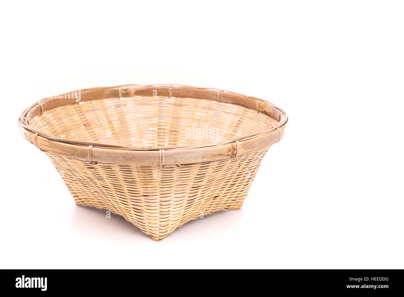 Empty bamboo basket handmade isolated on white background Stock Photo