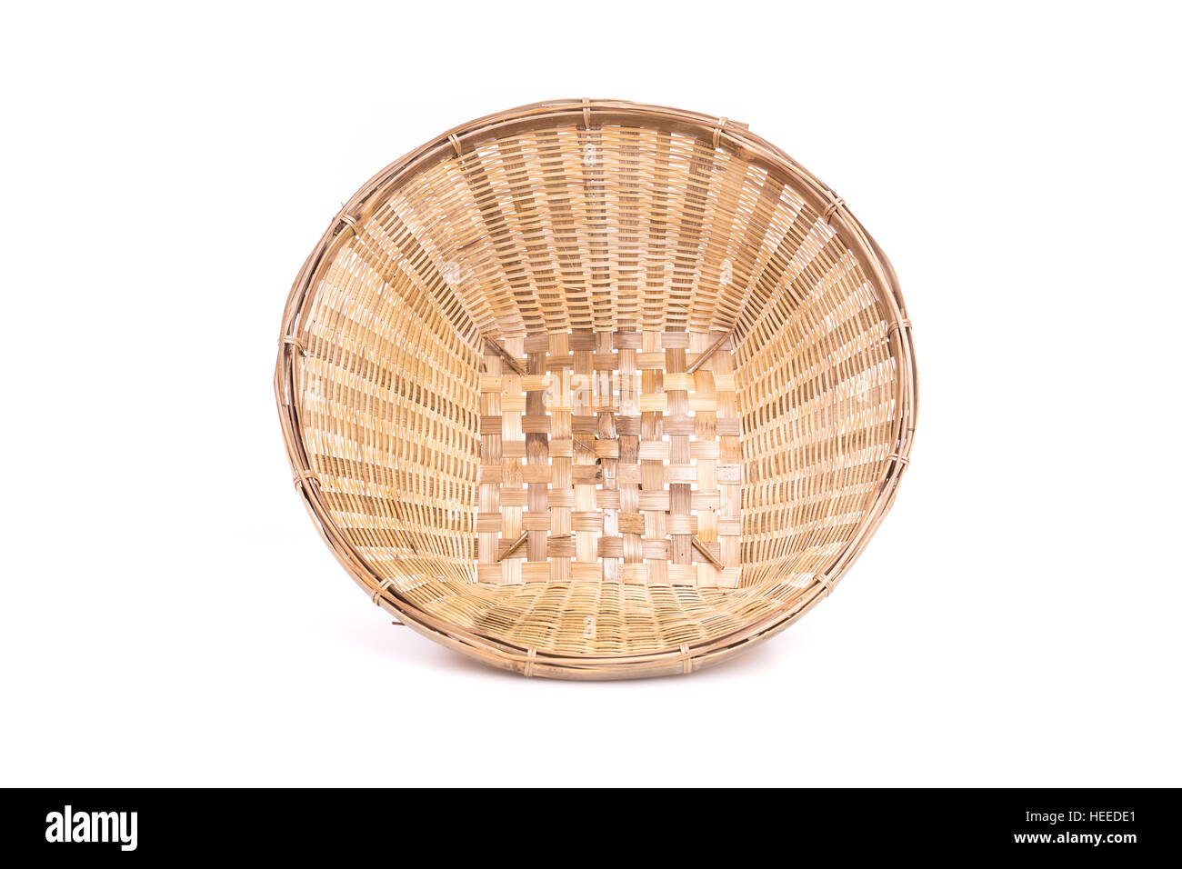 Empty bamboo basket handmade isolated on white background Stock Photo