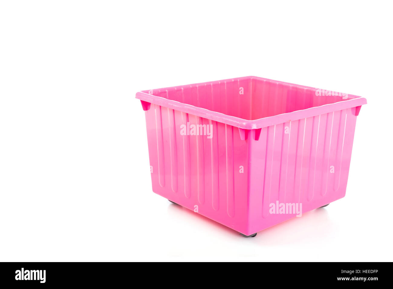 Empty pink plastic box isolated on white background Stock Photo