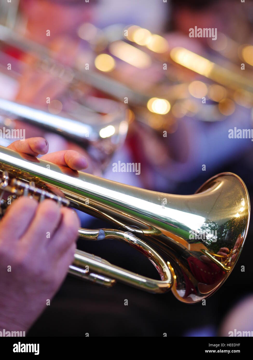 trumpet in the hand somebody Stock Photo