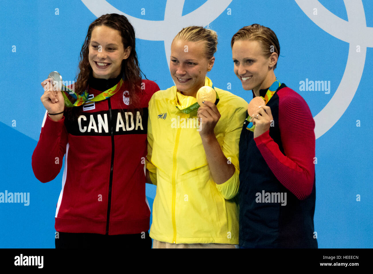 Rio de Janeiro, Brazil. 7 August 2016.   Sarah Sjostrom (SWE)-C- the gold medal winner of the Women's 100m Butterfly with Penny Oleksiak (CAN)-silver Stock Photo