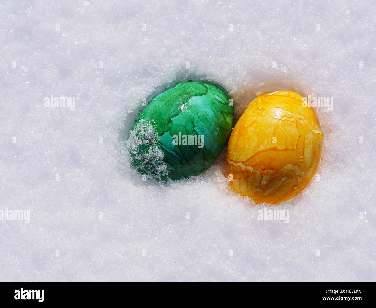 Easter eggs in snow Stock Photo Alamy