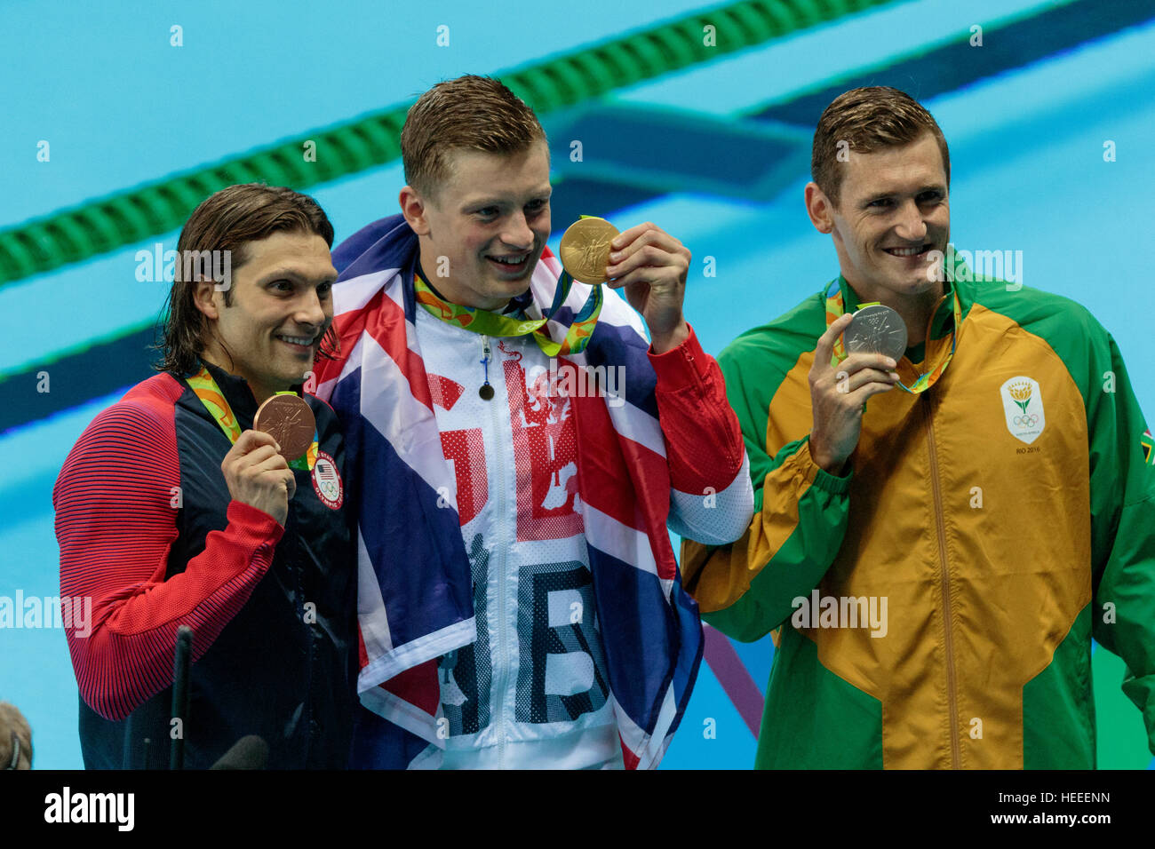 Rio de Janeiro, Brazil. 7 August 2016.   Adam Peaty (GBR) the gold medal winner of the Men's 100m Breaststroke with Cody Miller (USA)-L- bronze and  C Stock Photo