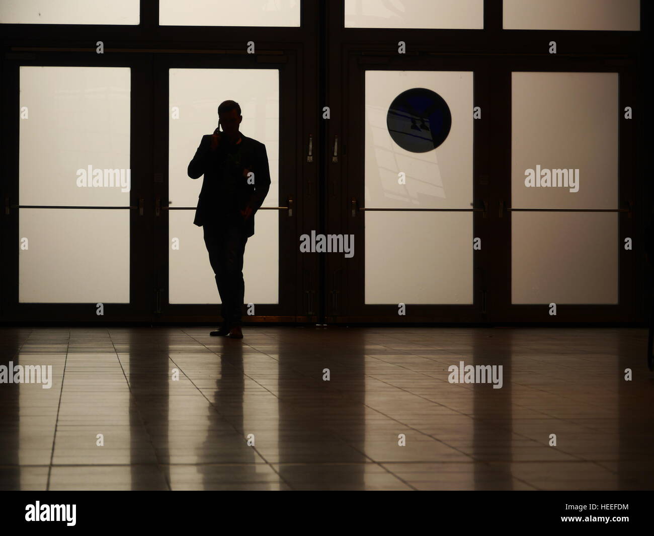 silhouette man phoning Stock Photo