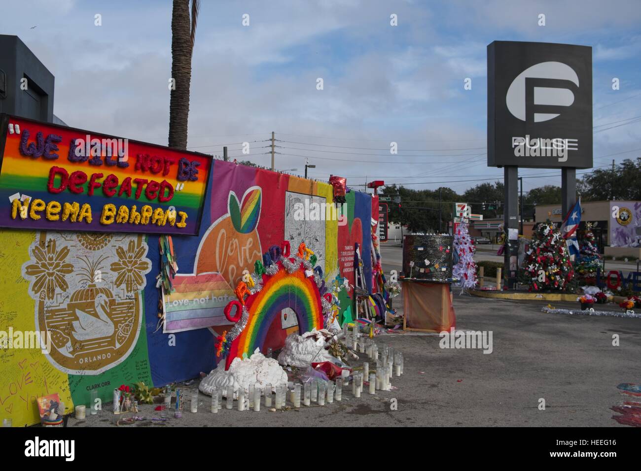 Tributes are left at a makeshift memorial around the Pulse Nightclub December 18, 2016 in Orlando, Florida. On June 12, 2016 49 people were killed and 53 injured in the deadliest mass shooting by a single gunman in U.S. history, and the deadliest terrorist attack on U.S. soil since the events of September 11, 2001. Stock Photo