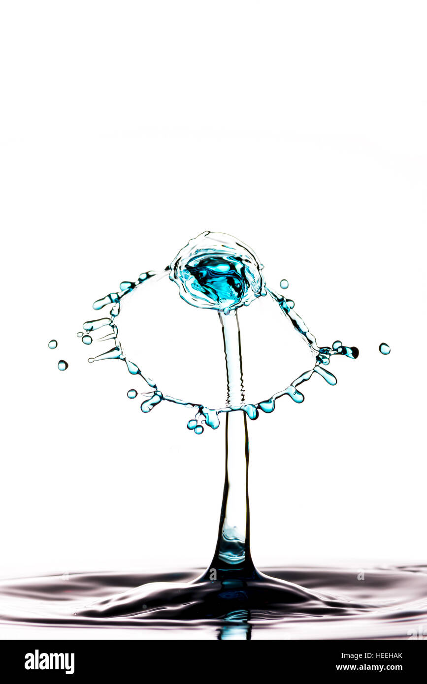 Water droplets colliding captured using high speed flash technique Stock Photo