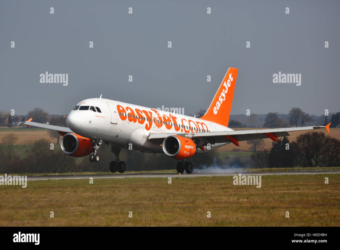 Low-cost airline Easyjet Airbus A319 G-EZGD landing at London Luton Airport, UK Stock Photo