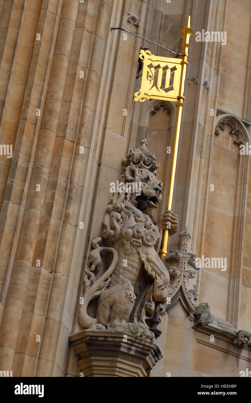 Lion statue on the Victoria tower of the houses of parliament in London, UK Stock Photo