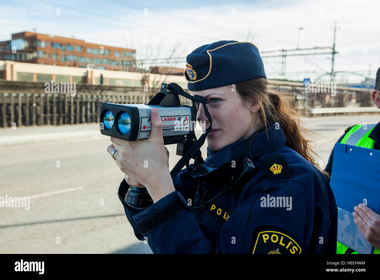 Police measuring vehicle speed Stock Photo Alamy