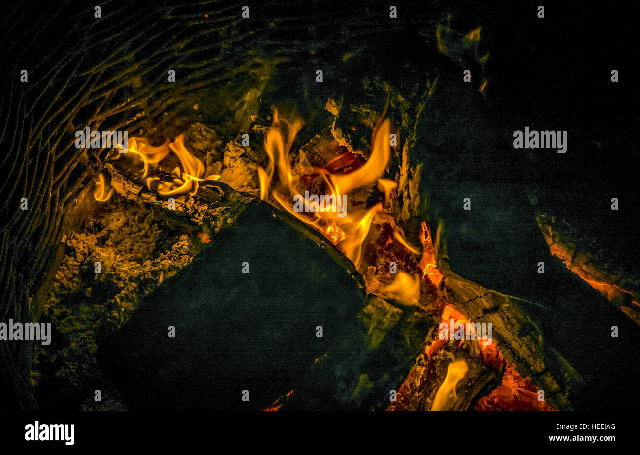 Flames and embers of a camp fire Stock Photo