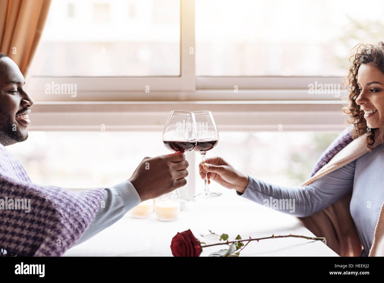 Happy African American couple drinking wine in the restaurant Stock ...