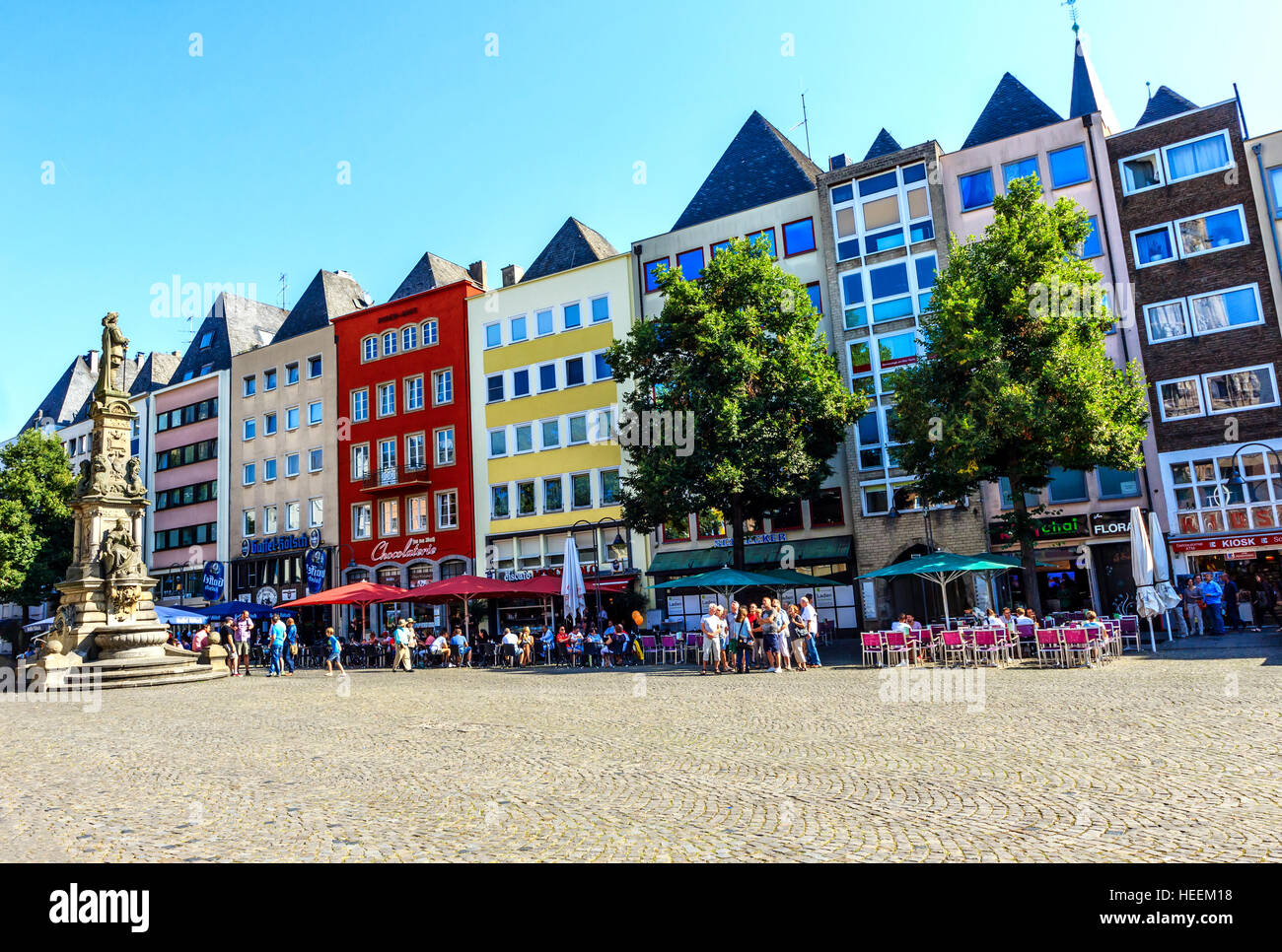 A row of colorful houses at the Alter Markt square in Cologne, Germany