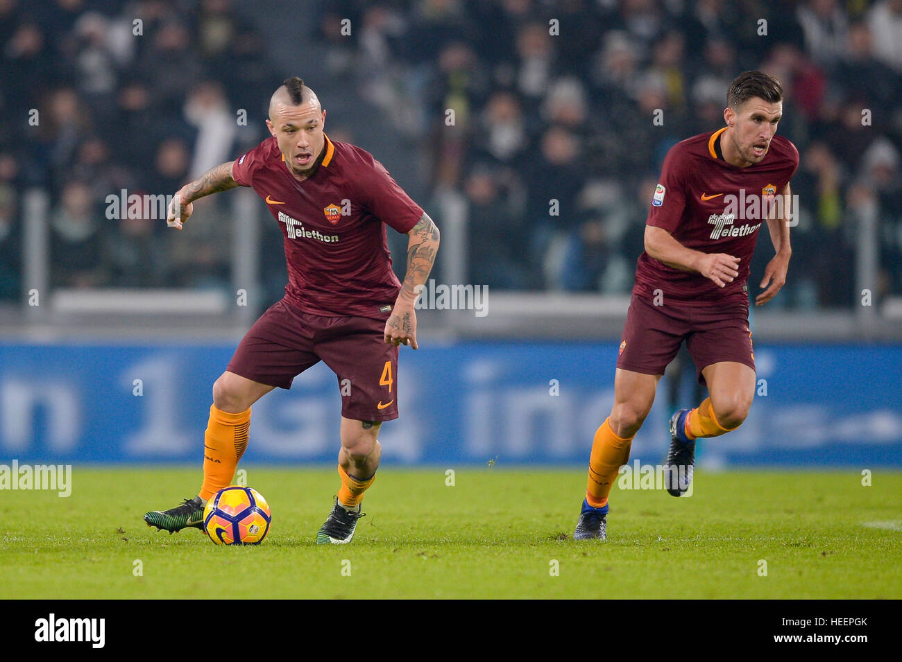 Turin, Italy. 2016, 17 december: Radja Nainggolan (left) and Kevin Strootman of AS Roma in action during the Serie A football match between Juventus F Stock Photo