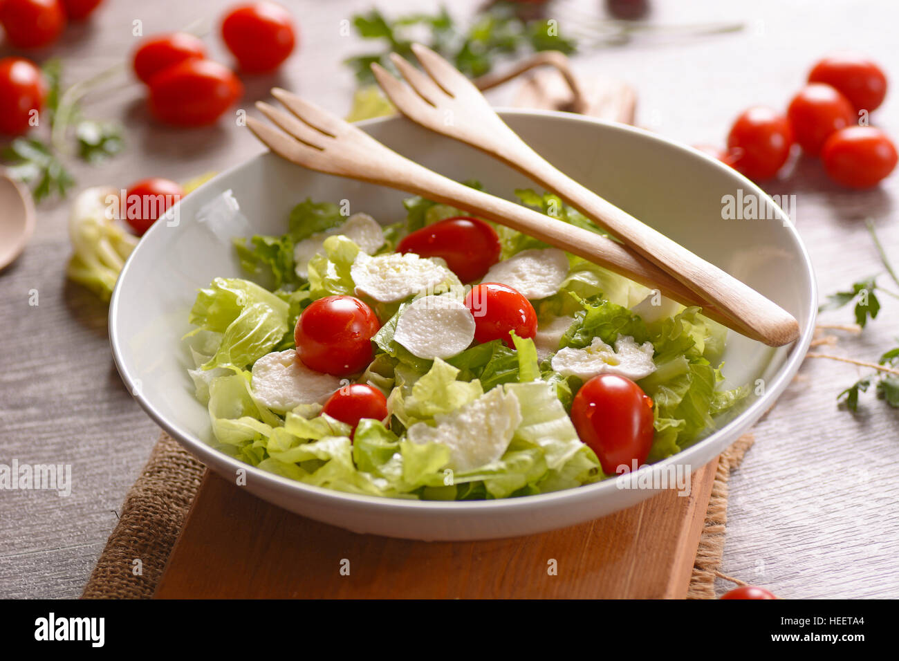 lettuce salad, mozzarella and tomato Traditional Italian recipe Stock