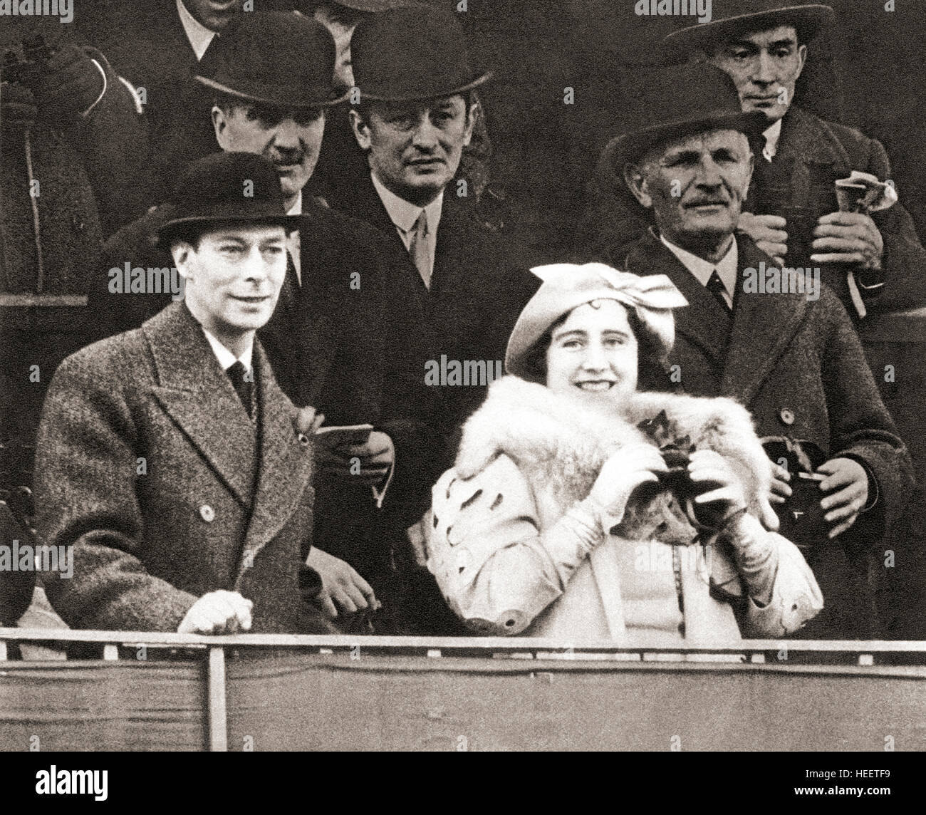 King George VI and Queen Elizabeth seen here in the Royal Box at Aintree racecourse for the 1937 Grand National.  Prince Albert, future King George VI, 1895 – 1952.  King of the United Kingdom and the Dominions of the British Commonwealth. Elizabeth Angela Marguerite Bowes-Lyon,1900 –2002. Queen Elizabeth. Stock Photo