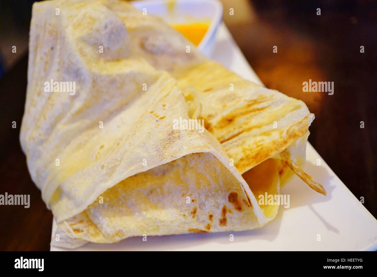 Layered paratha flatbread called Roti Canai in Malaysia Stock Photo