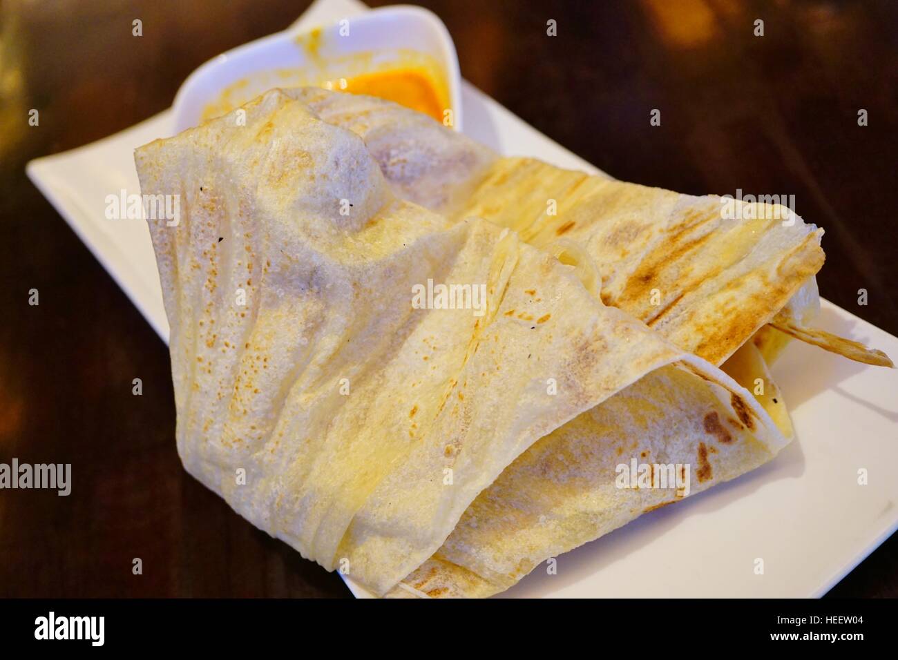Layered paratha flatbread called Roti Canai in Malaysia Stock Photo