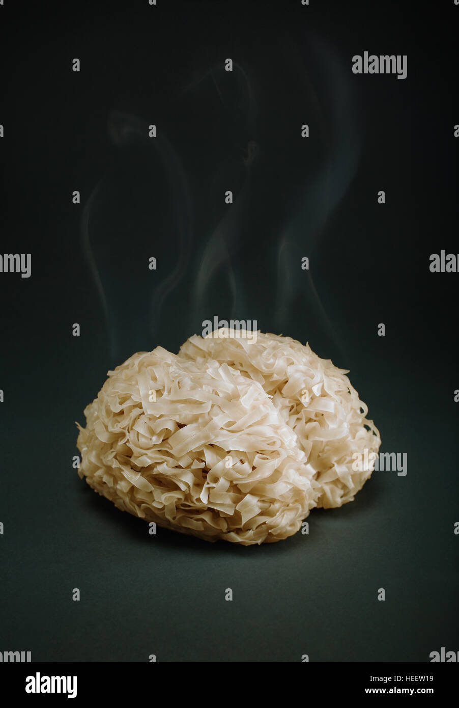 Pasta brain made of hot, steamy tagliatelle Stock Photo