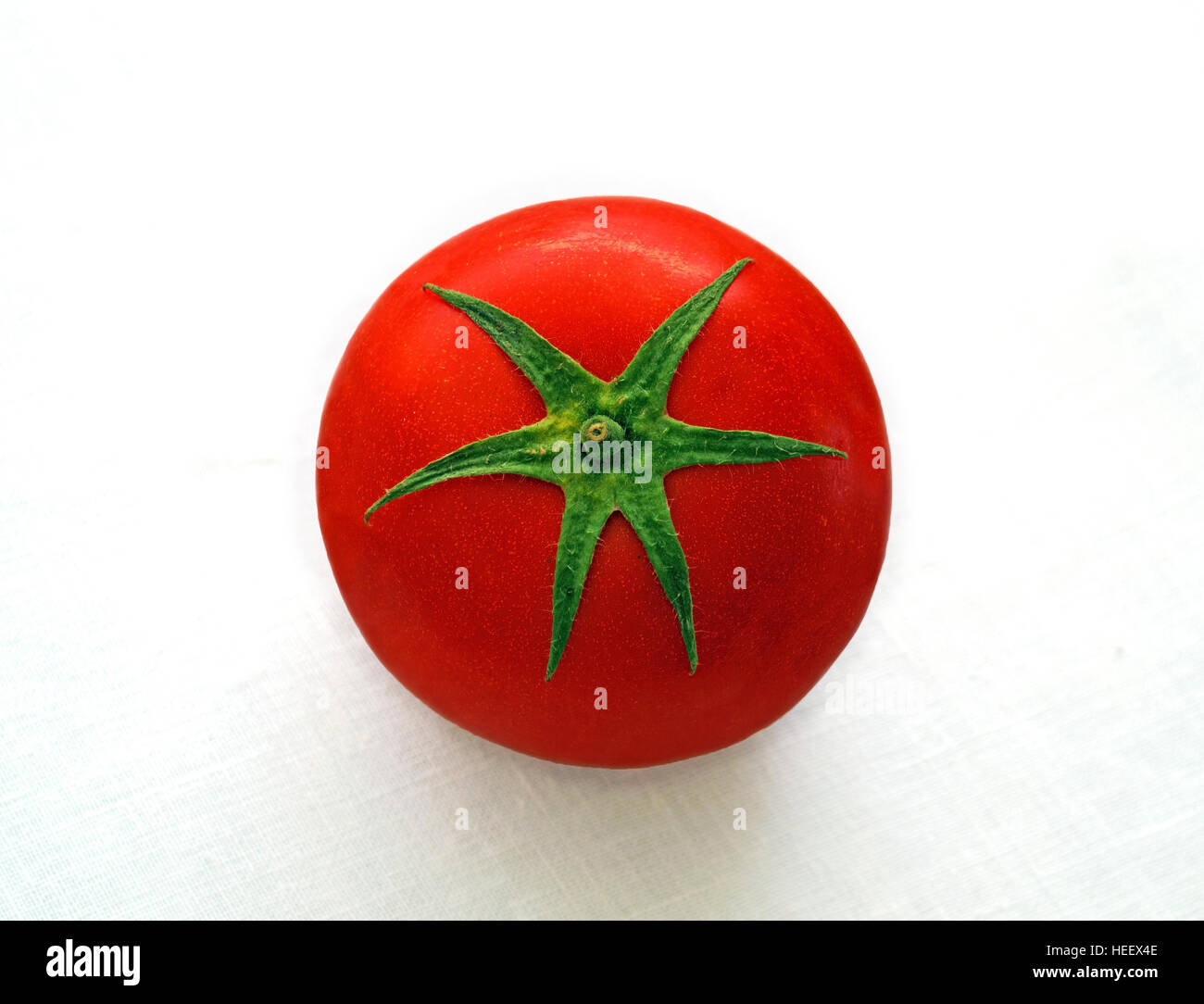 red tomato isolated on white background Stock Photo - Alamy