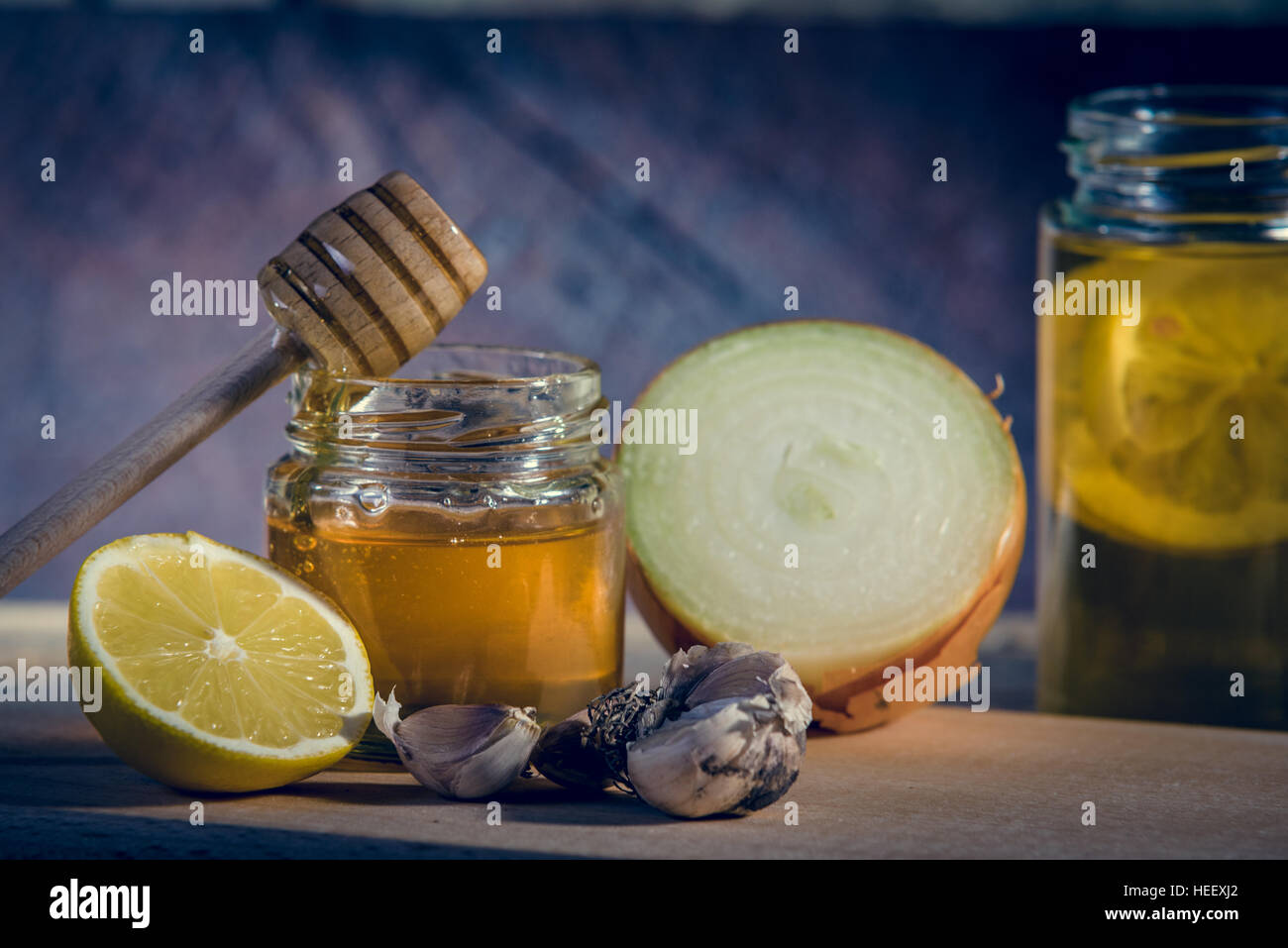 Natural medicines against flue and cold. Honey, lemon, hot tea, onion