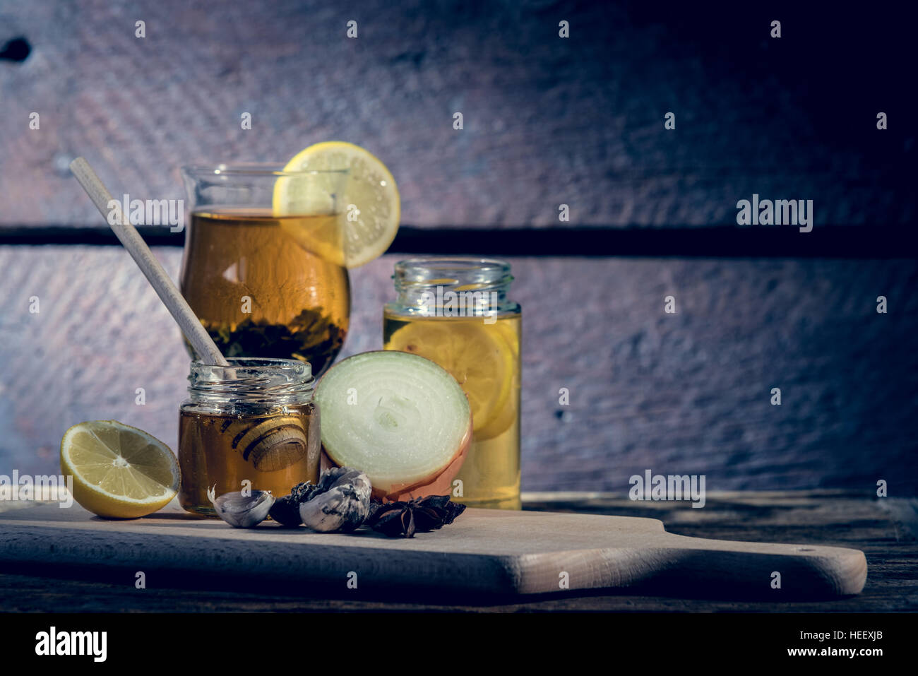 Natural medicines against flue and cold. Honey, lemon, hot tea, onion