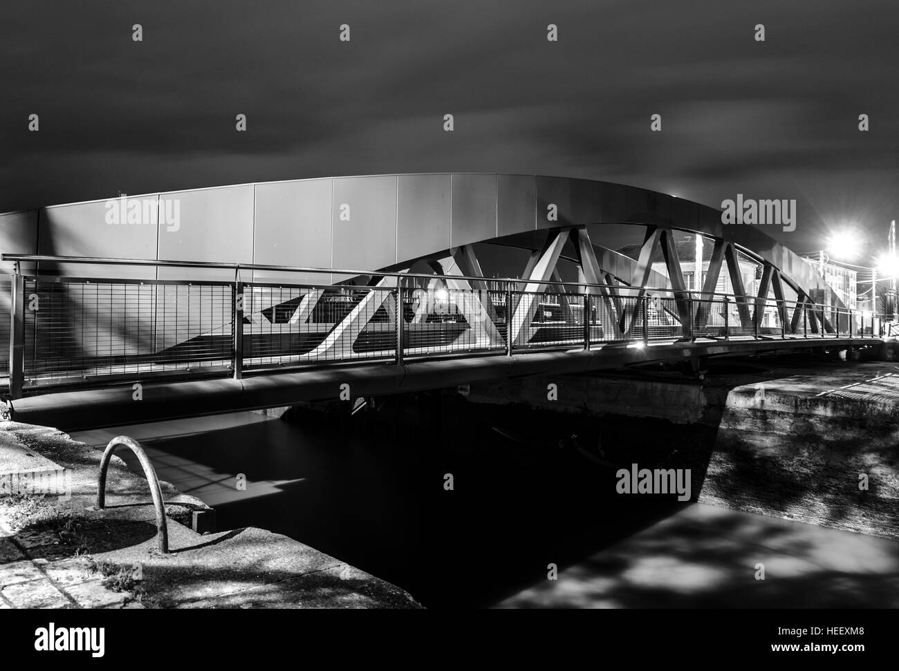 black and white bridge over water lock Stock Photo