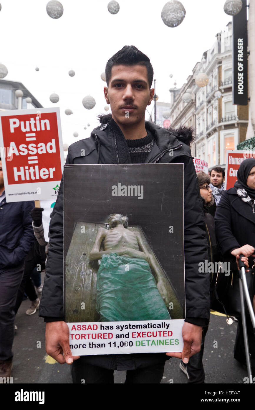 Syrians march to Downing Street calling for the West to do more to stop the genocide in Aleppo, London Dec17 2016 Stock Photo