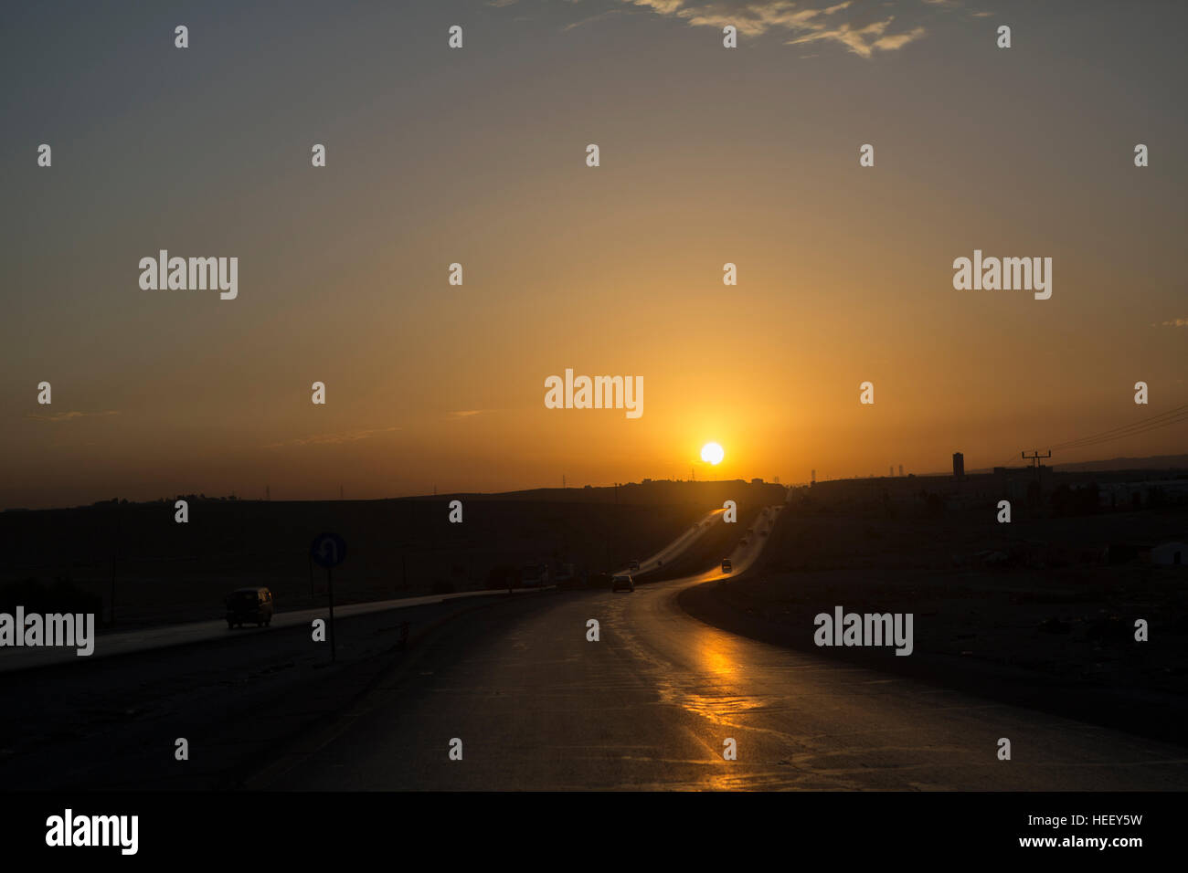 Sunset over a highway in Amman, Jordan. Stock Photo