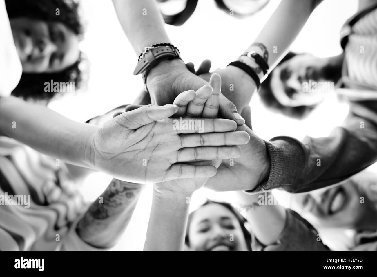 Teamwork hand Black and White Stock Photos & Images - Alamy