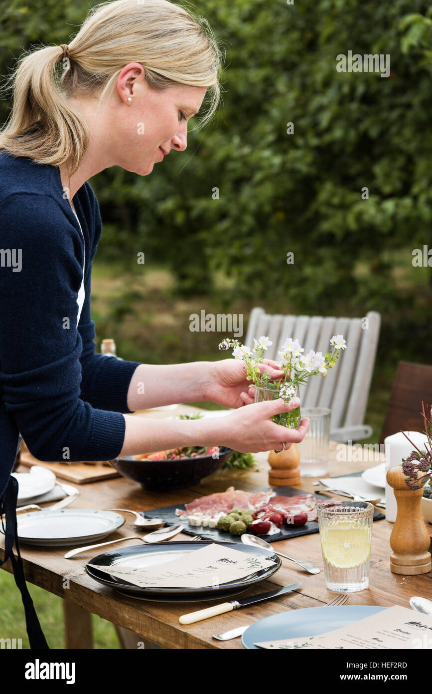 Woman Preparing Table Dinner Concept Stock Photo - Alamy