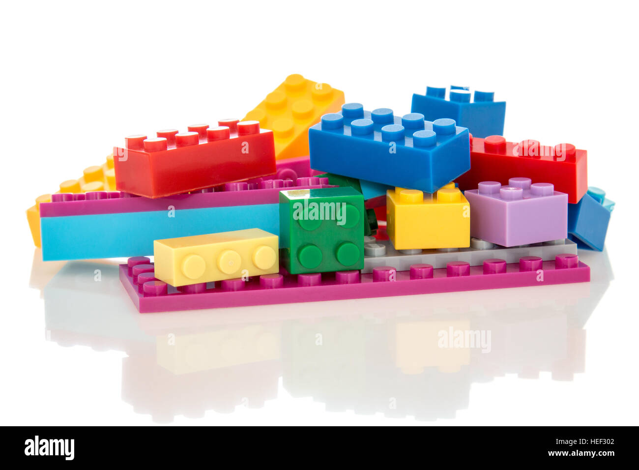 Toys background with colorful plastic building blocks isolated on white ...