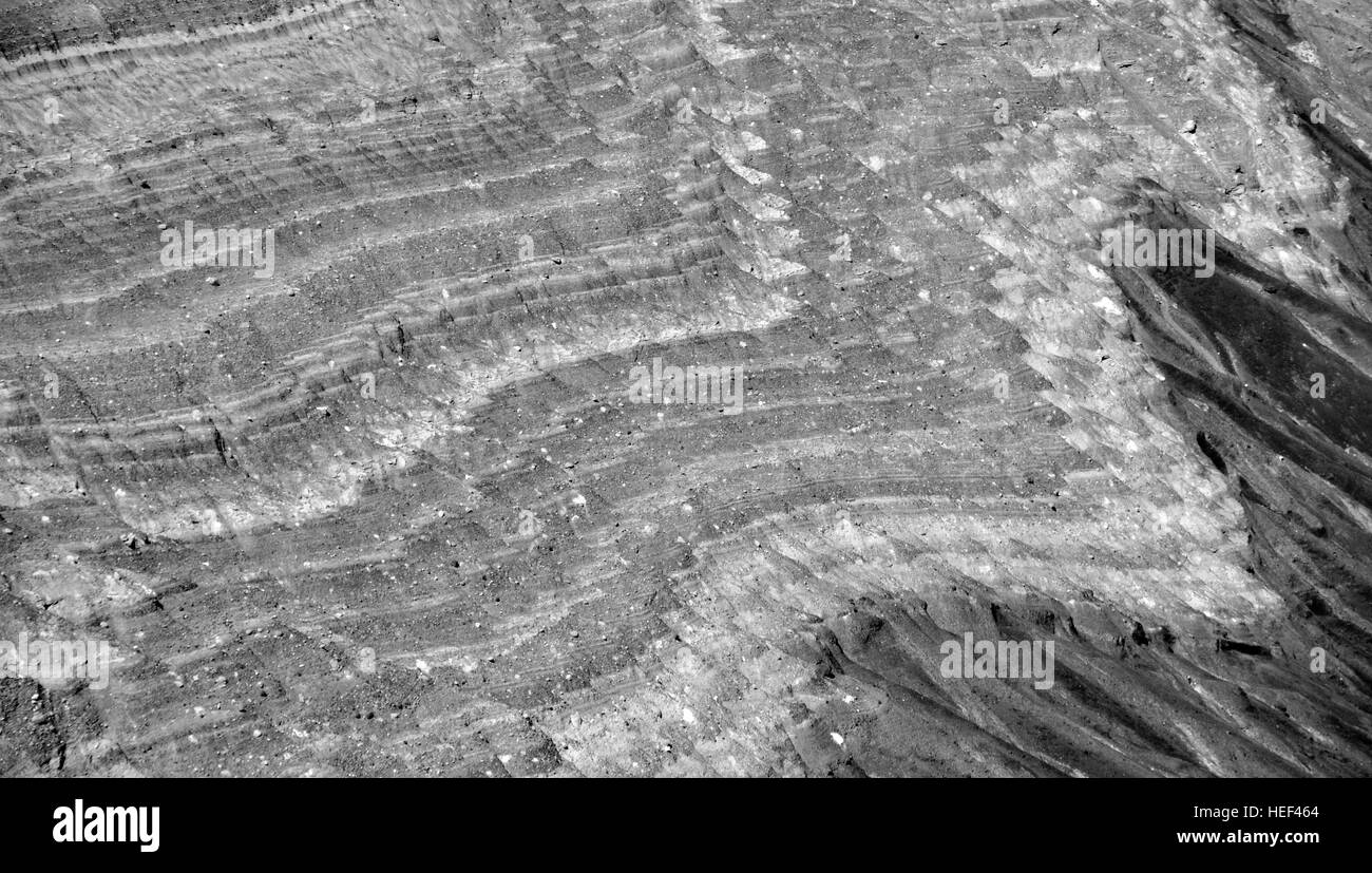 Differential erosion of volcanic sediments preserved in the wall of