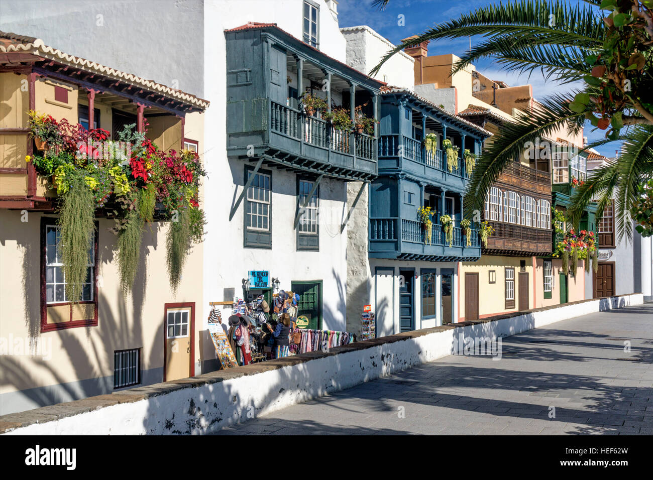 Row of houses along Avenida Maritima, wooden balconies with flowers, Santa Cruz, La Palma, Canary Islands, Spain Stock Photo