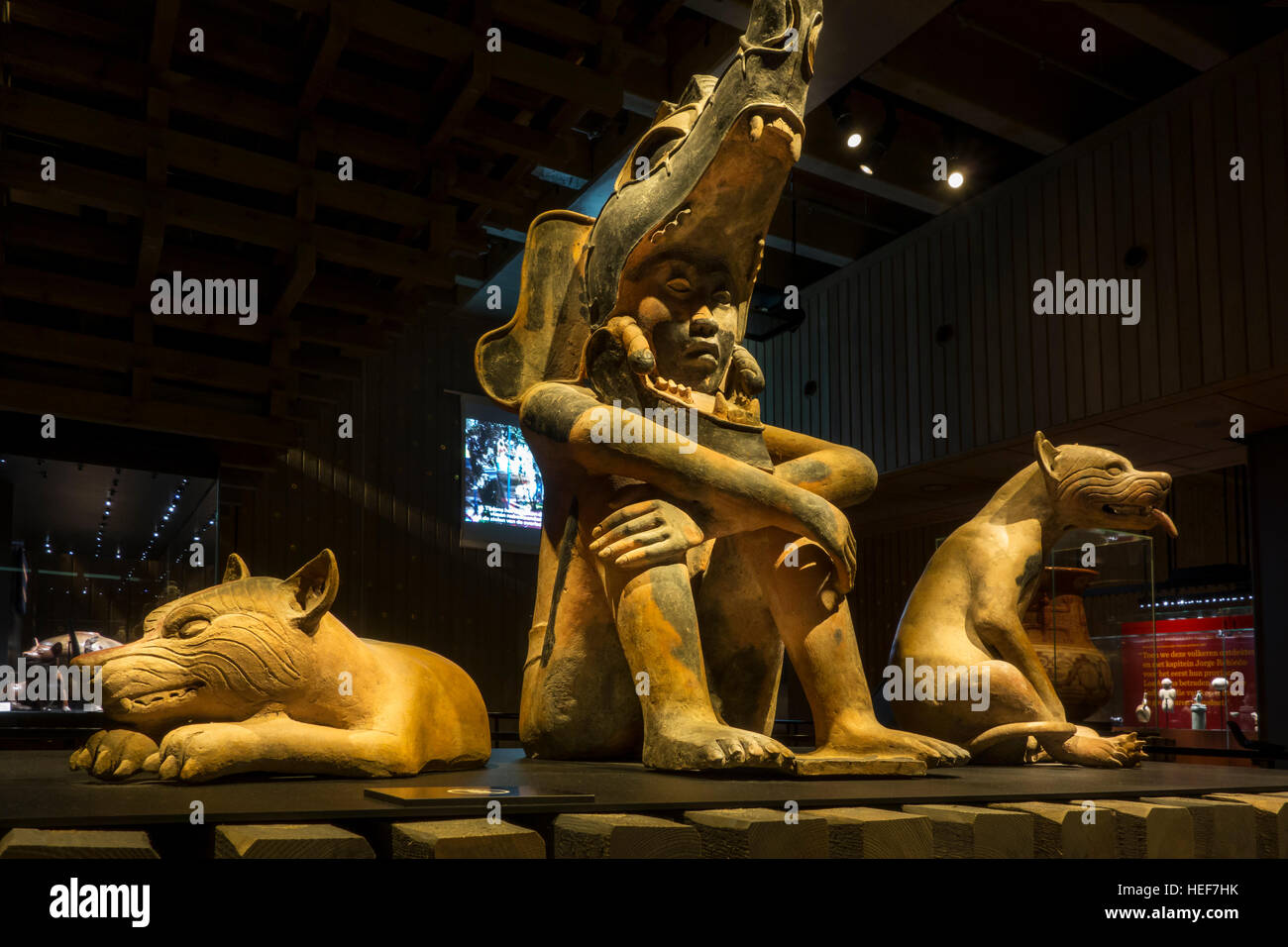 Sculpture group of Mexican warrior with two dogs at MAS / Museum aan de Stroom, Antwerp, Belgium Stock Photo