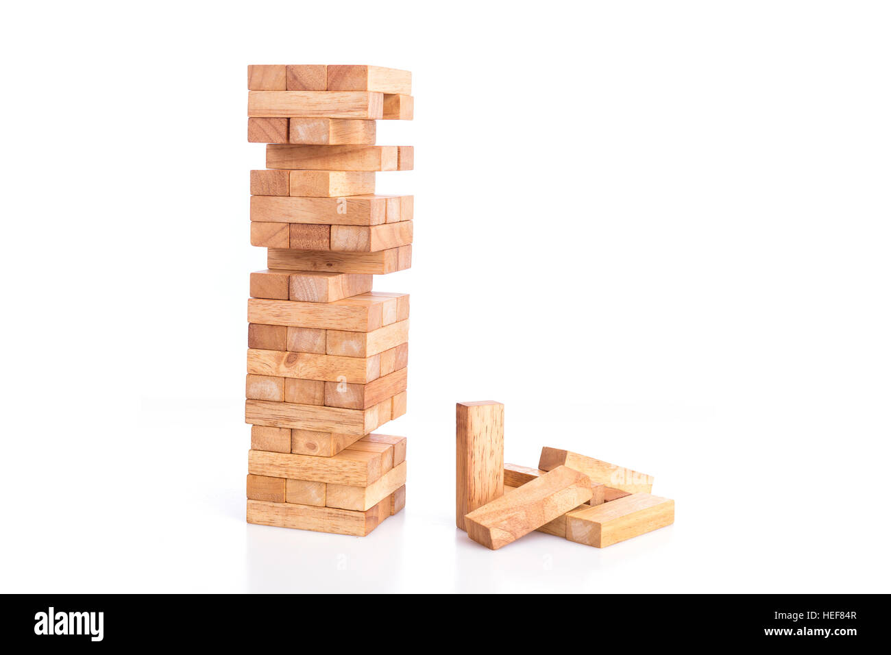 Close up blocks wood game (jenga) isolated on white background Stock Photo
