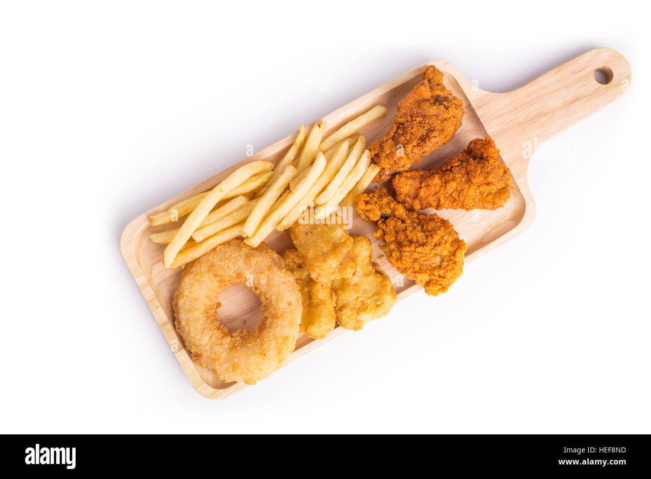Close up fried chicken, french fries and soft drink on wooden table Stock Photo