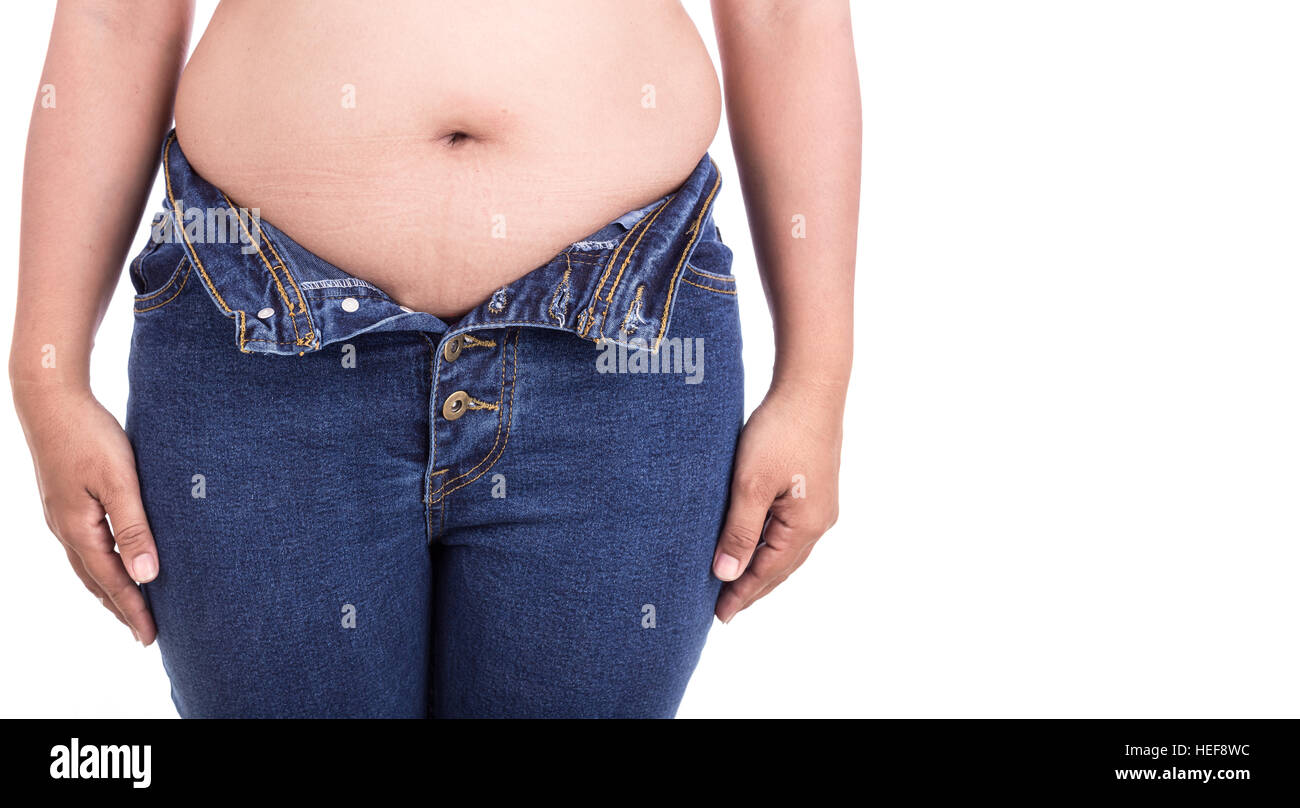 Close up fat woman trying to wear jeans : Fat and Healthy concept