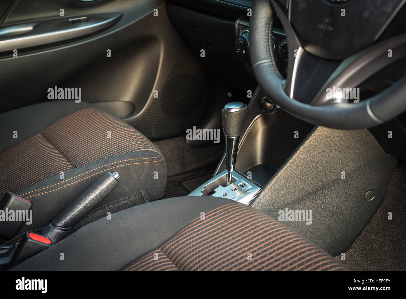 Detail of new modern car interior, Focus on gear Stock Photo