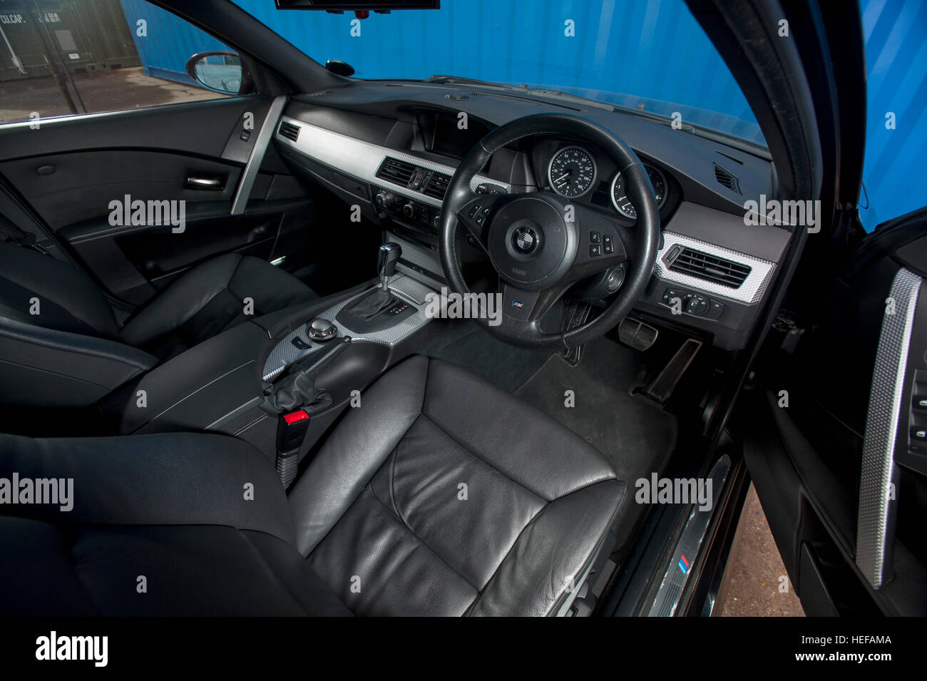 BMW 540i 5 Series Touring estate car, E61 shape (E60 station wagon 2003  -2010) black leather interior Stock Photo - Alamy