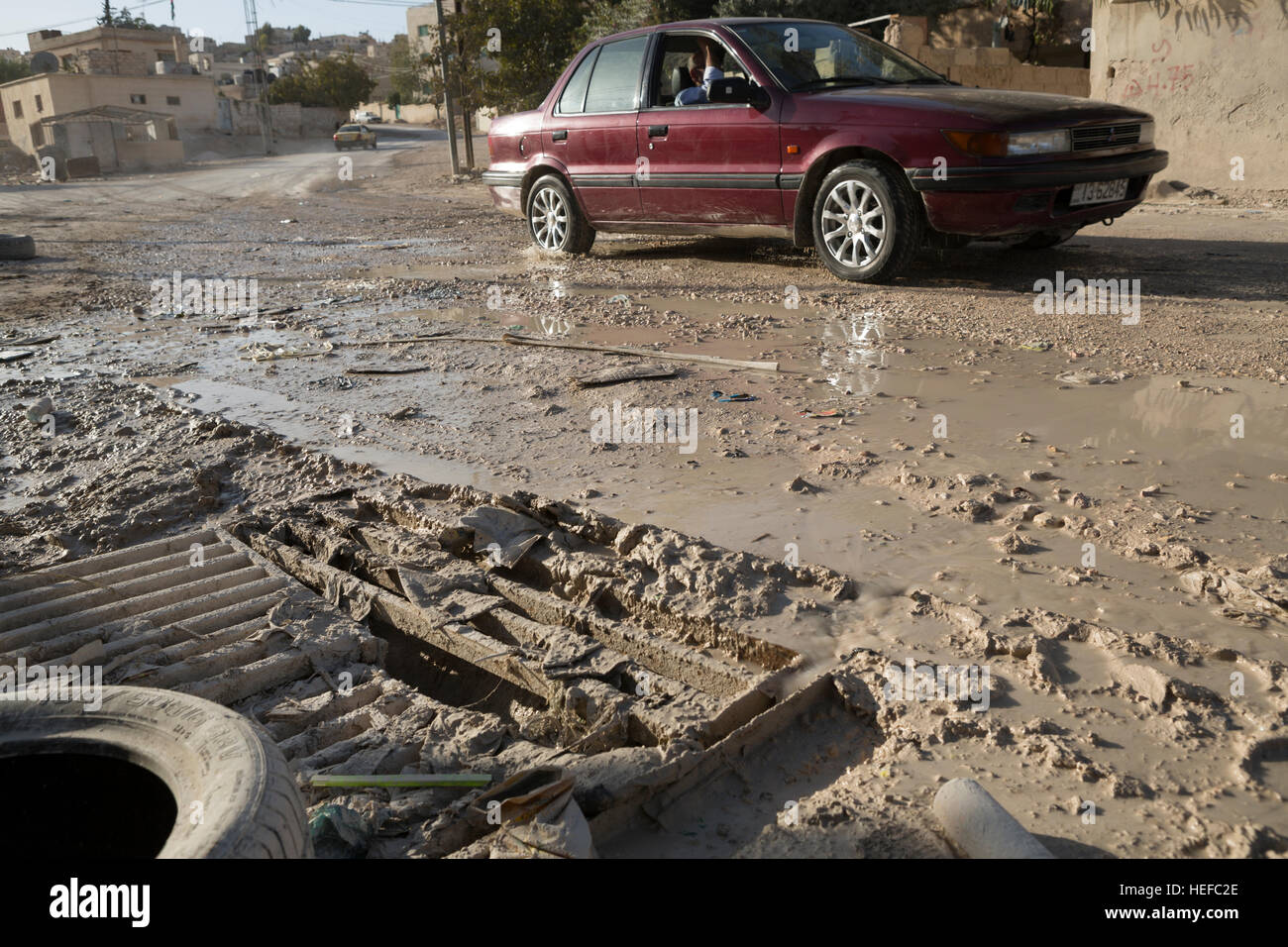 Sewage overflows in the streets of Zarqa, Jordan as a result of an overstressed wastewater treatment network. Stock Photo