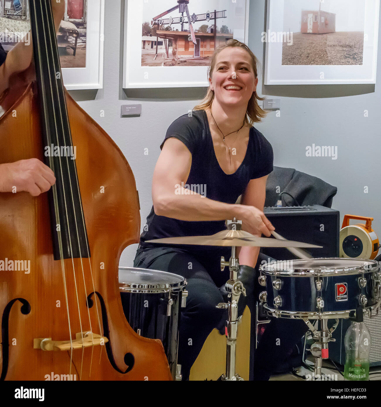 Female drummer with a cello player, Reykjavik Library, Reykjavik, Iceland Stock Photo
